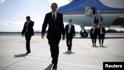U.S. President Barack Obama arrives at JFK Airport in New York. Obama is in New York for the United Nations General Assembly, Sept. 24, 2012.