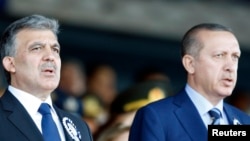 FILE - Turkey's President Abdullah Gul (L) and Prime Minister Recep Tayyip Erdogan