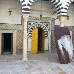 A dilapidated old mansion being restored in the Medina. Tunisia's revolution offered a mixed fallout for the quarter. (VOA/Lisa Bryant)