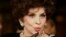 La actriz Gina Lollobrigida posa al llegar a una función de un documental sobre Miss Italia en la 7a edición del Festival Internacional de Cine de Roma en Roma, el 16 de noviembre de 2012.
