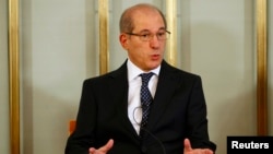 Director General of the Organization for the Prohibition of Chemical Weapons Ahmet Uzumcu addresses a news conference at the Nobel Institute in Oslo, Dec. 9, 2013.