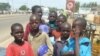 A group of child beggars stand in the streets of Kano, Nigeria on 17 Nov 2009