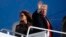 President Donald Trump and first lady Melania Trump board Air Force One, Nov. 29, 2018 at Andrews Air Force Base, Md.