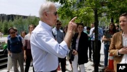 Former U.S. vice president and Democratic presidential candidate Joe Biden speaks to people in downtown Boston, Massachusetts, June 5, 2019. 