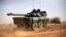 A French tank is seen heading north at the tail end of military convoy in Gao, northern Mali, Feb. 6, 2013.