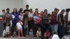 After Mass Escape, Migrants Protest Detention Conditions