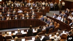 FILE - Israeli ministers and parliament members prepare to vote in the Knesset, Israel's parliament, in Jerusalem, May 29, 2019. The 120-member Knesset voted on July 17, 2024, to oppose the formation of a Palestinian state.