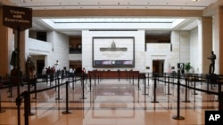 A smaller number of tourists visit the Capitol Visitors Center on Capitol Hill in Washington, March 12, 2020. Congress is shutting the Capitol to the public until April in reaction to the spread of the coronavirus, officials announced Thursday.