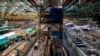 FILE - The 777 factory line, left, is seen next to the 787 line, right, at Boeing's Everett Production Facility, June 15, 2022, in Everett, Wash. 