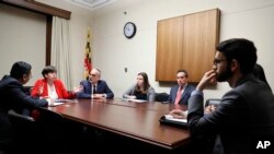 From left, Eftakhar Alam, with the Washington Islamic Society of North America; Rabbi Julie Schonfeld; Eli Epstein; Belle Yoeli and Ken Bandler, with the American Jewish Committee, meet with staff members from the office of Rep. Adriano Espaillat, D-N.Y., on Capitol Hill in Washington, Feb. 1, 2017. Bigoted rhetoric and harassment targeting both religions since the 2016 presidential election has drawn people together.