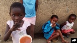 Poor children receive soup and bread from community and religious organizations in Durban, South Africa. (File Photo)