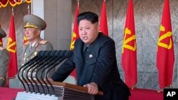 In this image made from video, North Korean leader Kim Jong Un delivers a speech during the ceremony to mark the 70th anniversary of the country's ruling party in Pyongyang, Oct. 10, 2015. 