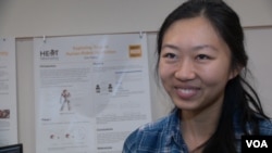 Jane Wu, a junior at Harvey Mudd College majoring in computer science and mathematics, writes computer code for autonomous robots.