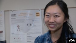 Jane Wu, a junior at Harvey Mudd College majoring in computer science and mathematics, writes computer code for autonomous robots.