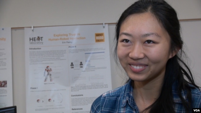 Jane Wu, a junior at Harvey Mudd College majoring in computer science and mathematics, writes computer code for autonomous robots.