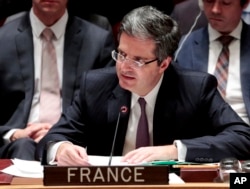 FILE - French U.N. Ambassador Francois Delattre, pictured at a Security Council meeting in March 2016, says that if more isn't done to ensure the cessation of hostilities is respected, Syria will “return to the horror and the resumption of clashes.”