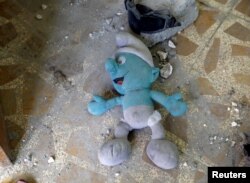 A stuffed toy is found inside an abandoned house previously used by the Islamic State militants in western Mosul, Iraq, June 15, 2017.