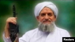 FILE - U.S. counterterrorism officials say there's no reason to believe an audio message released by al-Qaida's Ayman al-Zawahiri, seen in an image from a video released in 2011, is "not authentic."