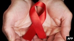 Nations and Groups Promise $12 Billion to Fight AIDS, TB & Malaria