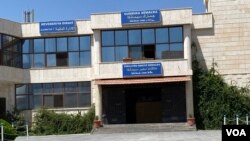 FILE - The Fishkhabour-Semalka border crossing opened in 2013 primarily for the entrance of humanitarian aid into war-torn Syria, June 19, 2021. (Sirwan Kajjo/VOA)