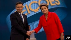 巴西舉行總統選舉投票，兩名總統候選人，現任總統迪爾馬•羅塞夫（右）和參議員阿埃西奧•內維斯（左）。
