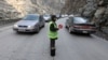 Afghan Children Direct Traffic on Mountain Pass for $4 a Day