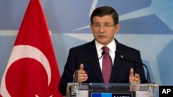 Le Premier ministre turc Ahmet Davutoglu à l'Otan, le 30 novembre 2015. (AP Photo/Virginia Mayo)