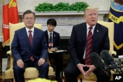 FILE - President Donald Trump meets with South Korean President Moon Jae-in in the Oval Office of the White House, May 22, 2018, in Washington.