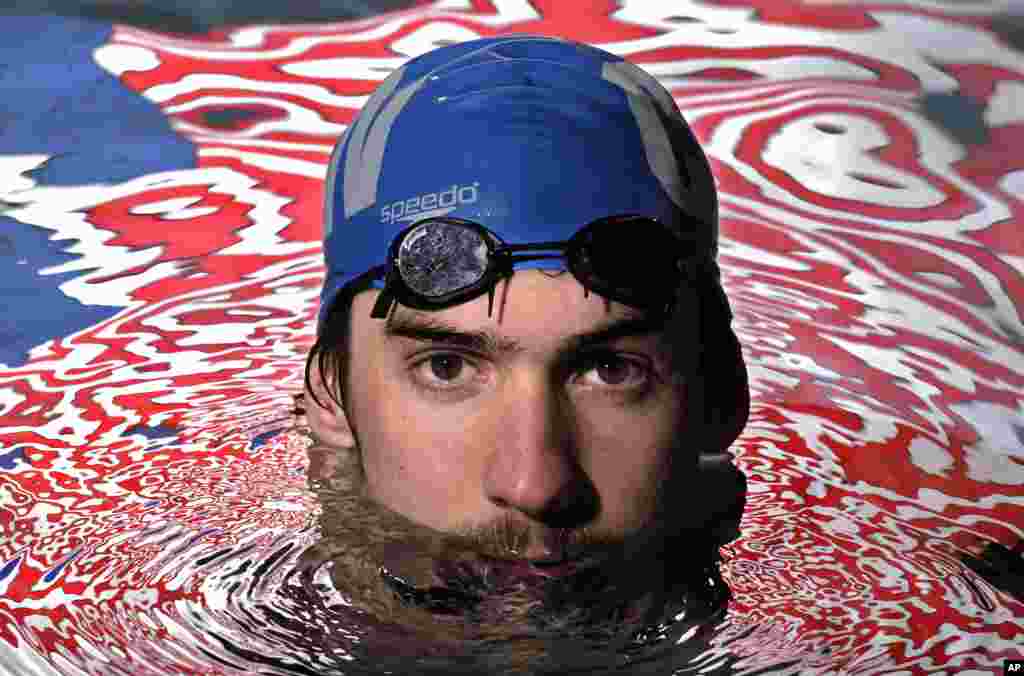 Olympic gold medalist Michael Phelps posing in the Belmont Plaza Olympic Pool in Long Beach, Calif. (Jan 2008 file photo)