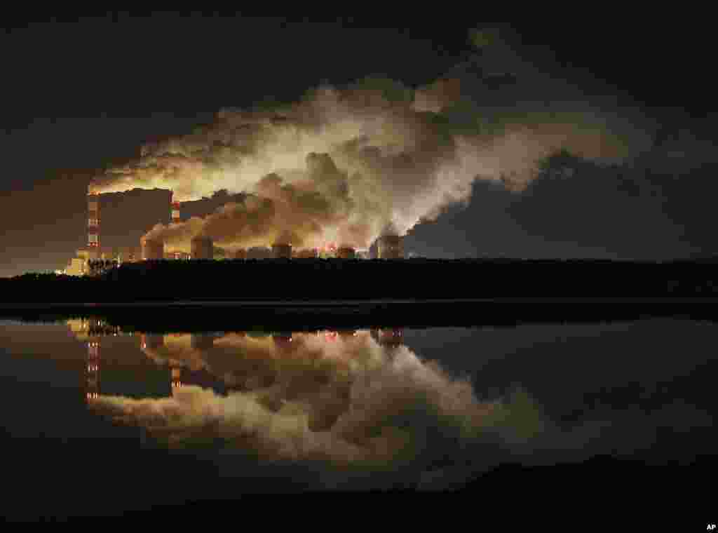 Clouds of smoke is seen over Europe&#39;s largest lignite power plant in Belchatow, central Poland, Nov. 28, 2018.