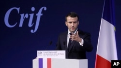 France's President Emmanuel Macron gives a speech during the 34rd annual dinner of the group CRIF, Representative Council of Jewish Institutions of France, in Paris, Feb. 20, 2019.