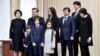 FILE - President Shavkat Mirziyoyev poses with his family after voting during the presidential election, Tashkent, Uzbekistan, Dec. 4, 2016.