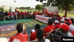 Members of the #BringBackOurGirls Abuja campaign group attend a sit-in protest, a day ahead of the 80th day of the abduction of over 200 schoolgirls, at the Unity fountain in Abuja, Nigeria, July 2, 2014.