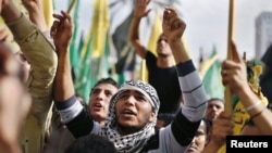 八天冲突后加沙城巴勒斯坦人欢庆所谓胜利