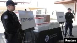 Packets of fentanyl mostly in powder form and methamphetamine, which U.S. Customs and Border Protection say they seized from a truck crossing into Arizona from Mexico, is on display during a news conference at the Port of Nogales, Arizona, Jan. 31, 2019.