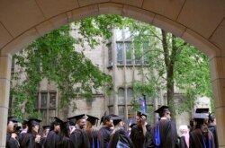 In this May 24, 2010 file photo, future graduates wait for the procession to begin for the graduation ceremony at Yale University in New Haven, Connecticut.