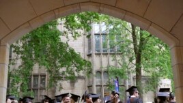 In this May 24, 2010 file photo, future graduates wait for the procession to begin for the graduation ceremony at Yale University in New Haven, Connecticut.