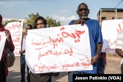Khartoum journalists protest for press freedom in Sudan during sit-in.