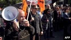 Public sector employees demonstrate in central Athens on November 13, 2012 against expected layoffs