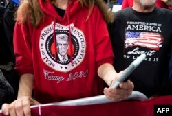 Supporters attend a US President Donald Trump "Keep America Great" campaign rally in Milwaukee, Wisconsin, January 14, 2020. (Photo by SAUL LOEB / AFP)