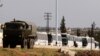 Rebels Begin Evacuation of Syria's Last Besieged Enclave