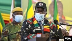 Zimbabwe President Emmerson Mnangagwa speaks at an annual conference of the ruling ZANU-PF party in Bindura, 80 kilometers north of Zimbabwe’s capital Harare, Oct. 30, 2021. (Columbus Mavhunga/VOA)