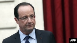 France's President Francois Hollande is seen in Paris in a December 21, 2012, file photo.