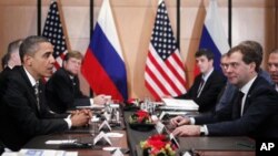 President Barack Obama meets with President Dmitry Medvedev of Russia on the sidelines of the APEC summit in Yokohama, Japan, Sunday, Nov. 14, 2010.