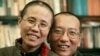 Chinese dissident Liu Xiaobo and his wife, Liu Xia, pose in this undated photo released by his family, Oct. 3, 2010. 