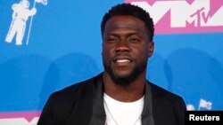 FILE - Kevin Hart arrives at the 2018 MTV Video Music Awards at Radio City Music Hall, New York, Aug. 20, 2018.