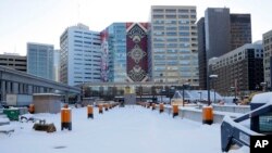 The site of the former J.L. Hudson Co. department store, is seen Dec. 14, 2017, in Detroit. Ground was broken for a new 800-foot-tall, $900 million two-building project on the site that will include a 58-story residential tower and 12-floor building for retail and conference space.