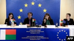 Members of the European Union Election Observation Mission in Madagascar, Peggy Corlin (L), Philippe Boulland (2nd L), Maria Muniz de Urquiza (2nd R), and Sandrine Espinoza, speak to journalists during a press conference concerning election results in Ant