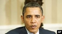 US President Barack Obama speaks during a meeting with Australian Prime Minister Julia Gillard (not seen) in the Oval Office of the White House in Washington, DC, March 7, 2011