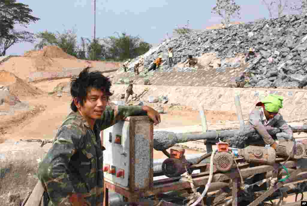 Burmese laborer Khun Kyar Kan has been working in the area for three years. (D. Schearf/VOA)